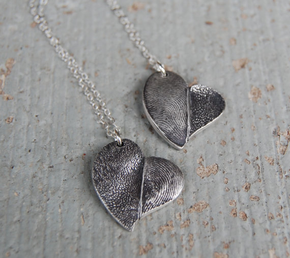 Kaleen Wolfe works closely with her clients to create custom, one-of-a-kind jewelry. One of her specialties? Nose print and paw print jewelry!