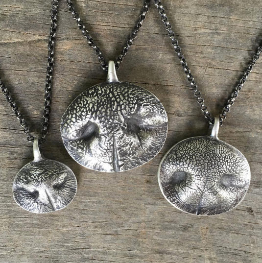 Kaleen Wolfe works closely with her clients to create custom, one-of-a-kind jewelry. One of her specialties? Nose print and paw print jewelry!