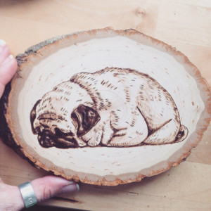 We interview Chelsea of The Pastel Pug, an Etsy shop featuring wood burned and painted human and portraits. Plus: A GIVEAWAY!