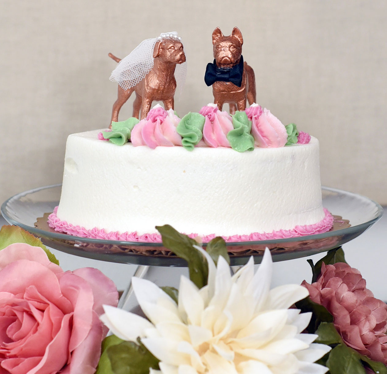 Looking for a way to include your pup in your wedding or simply express your canine love to your guests? These DIY dog wedding cake toppers are affordable, fun, and relatively easy to make!