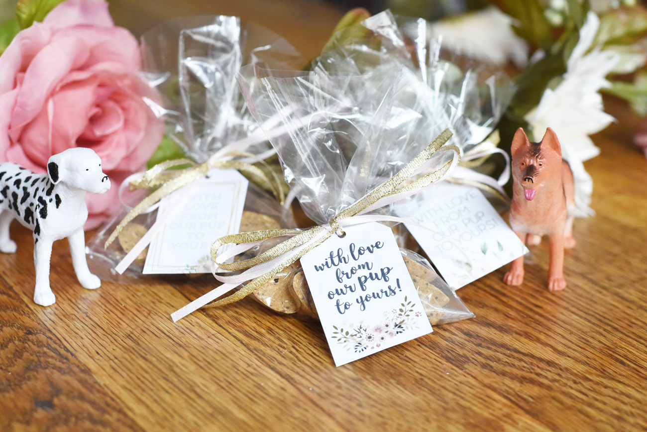 It's easier than you think to honor your pup on your wedding day! Ensure your party reaches the pups at home with these dog treat wedding favors with free printable tags.